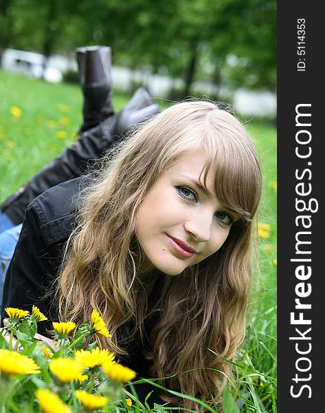 Beautiful woman enjoying the sun in the park