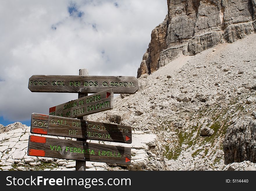 Wood path sign at Dolomites Alps (Italy)