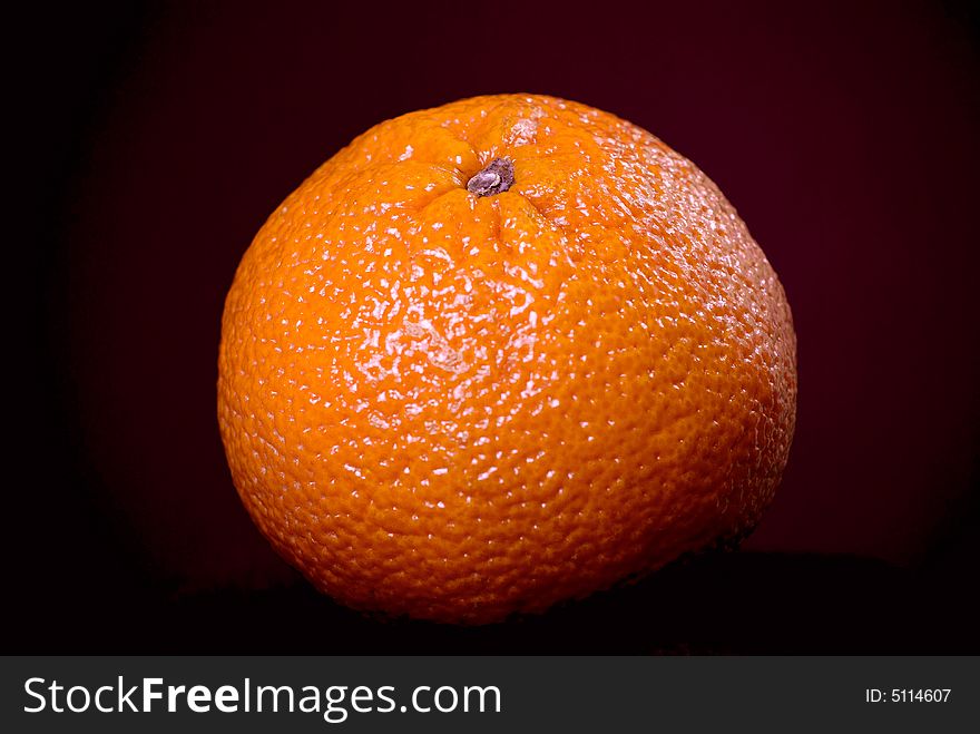 Fruit of orange on the black background