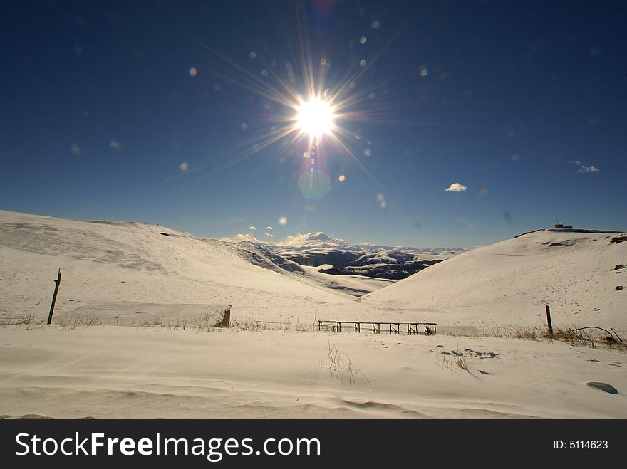 Sun Elbrus and snow deserе. Wonderfull image. Sun Elbrus and snow deserе. Wonderfull image