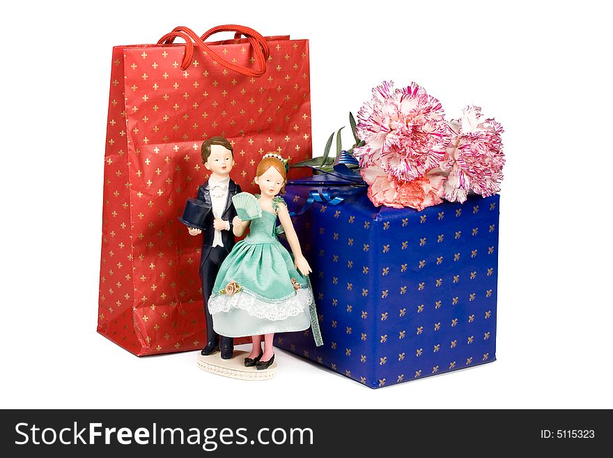 Gifts And Flowers On A White Background