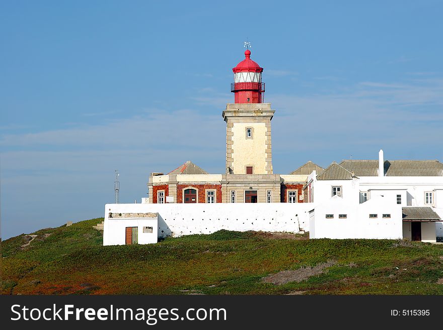 Old historic red lighthouse building. Old historic red lighthouse building