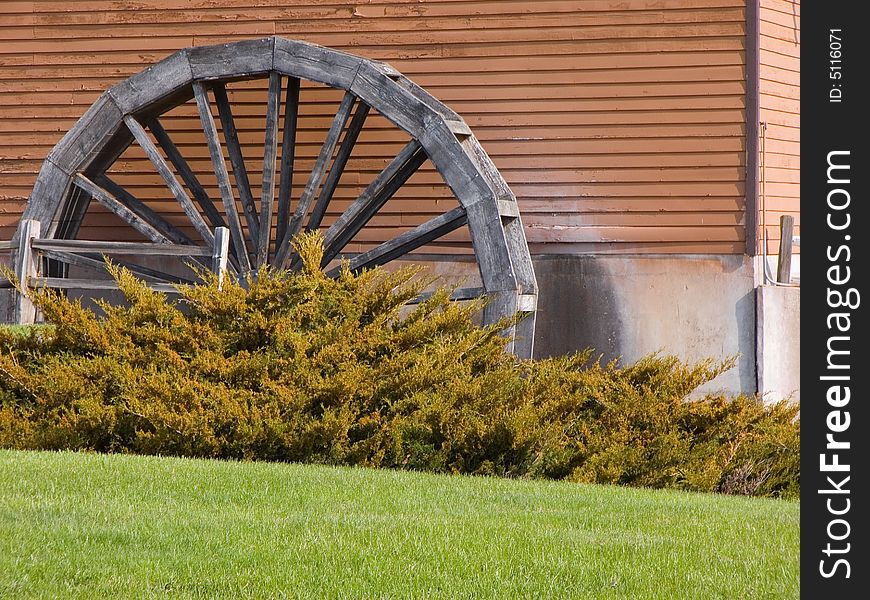 Old watermill next to a building no longer in use