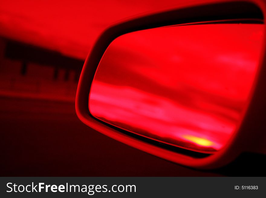 Reflection of mountains and sunset in side view mirror. Reflection of mountains and sunset in side view mirror