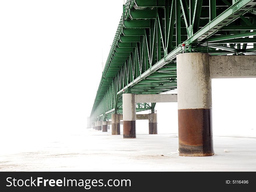 View of Bridge from underneath. span disappearing into heavy weather. View of Bridge from underneath. span disappearing into heavy weather.