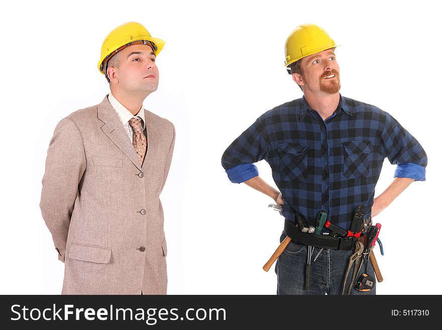 Construction worker pointing on architectural plans and architect. Construction worker pointing on architectural plans and architect