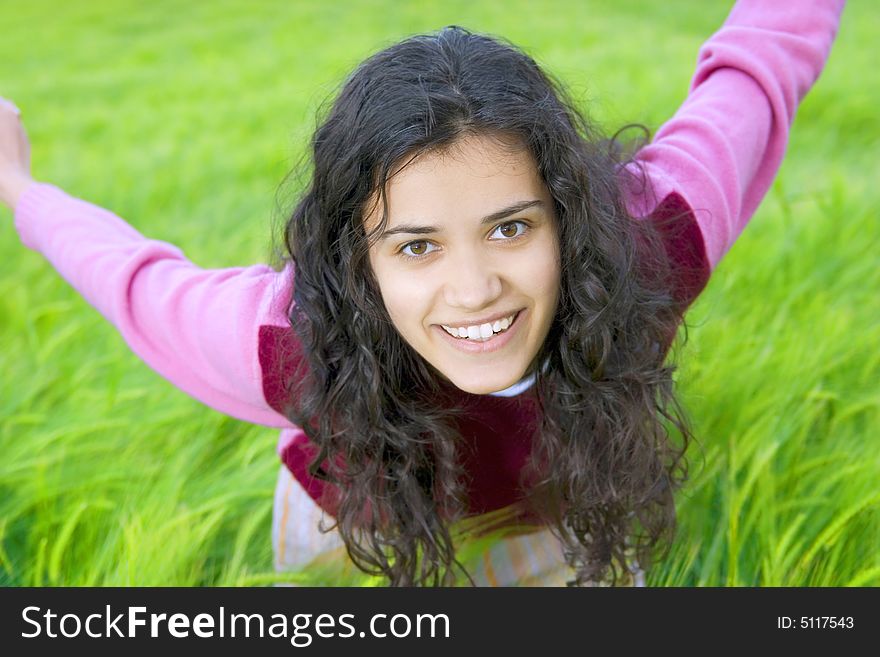 Young woman in field of wheat