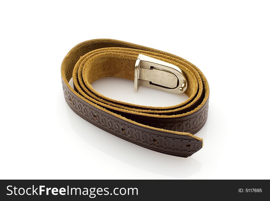 Brown leather belt, rolled, white background. Brown leather belt, rolled, white background