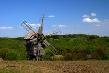 Windmill With Fresh Green Grass And Clear Blue Sky Stock Photos Windmill With Fresh Green Grass And Clear Blue Sky Stock Photos