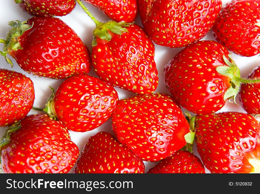 Group of strawberries close-up on white. Group of strawberries close-up on white