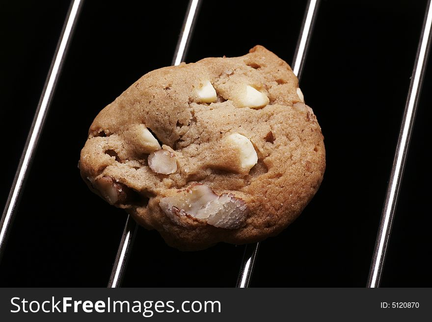 Cookie Biscuit With White Chocolate And Nuts On Oven Rack