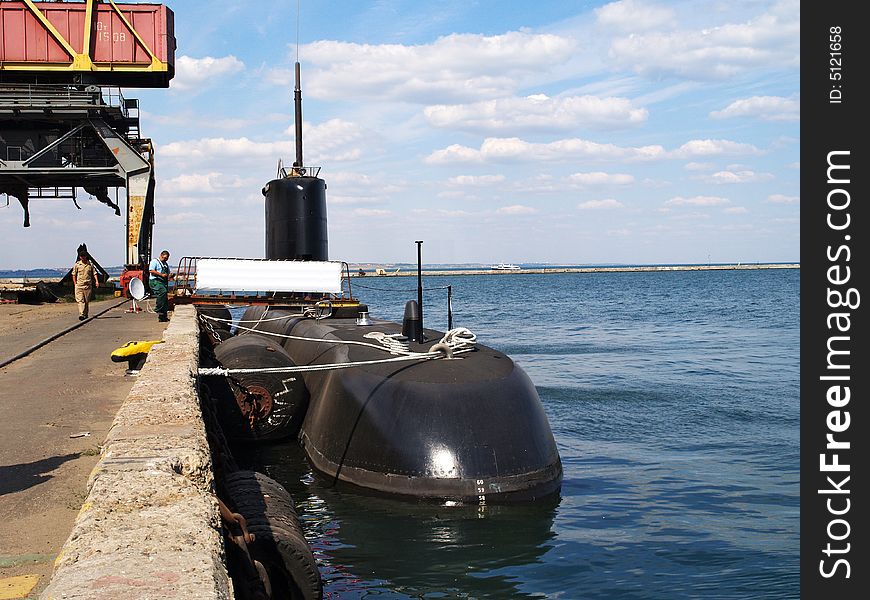 Submarine in a port bay