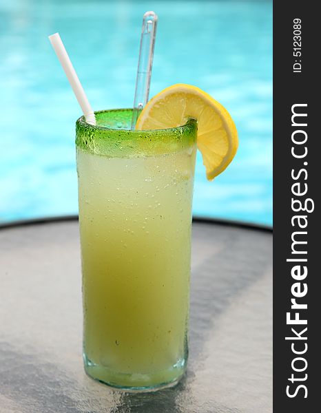 A cooling drink by the pool. A cooling drink by the pool