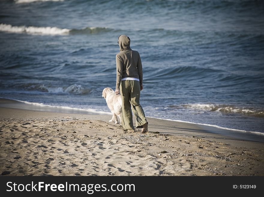 Girl walking with dog