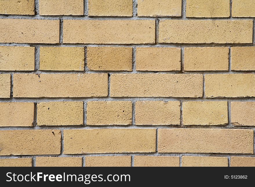 Yellow brick wall background / texture