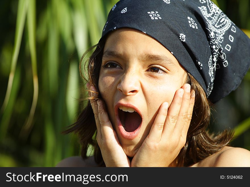 Boy displaying a shocked facial expression. Boy displaying a shocked facial expression.