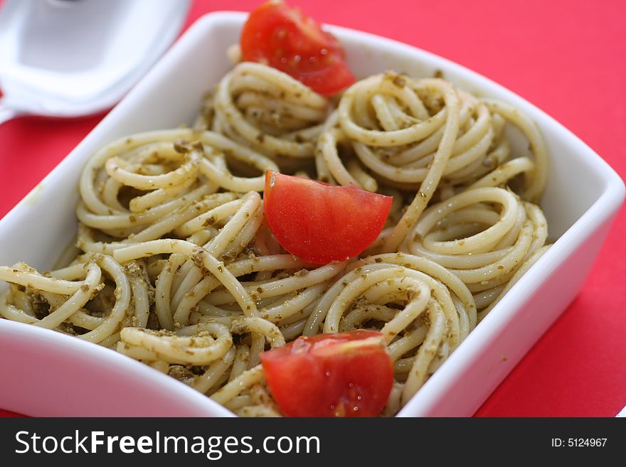 Some noodles with Pesto and tomatoes. Some noodles with Pesto and tomatoes