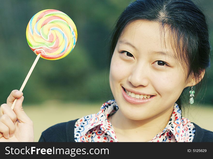 Young asian girl with Lollipop