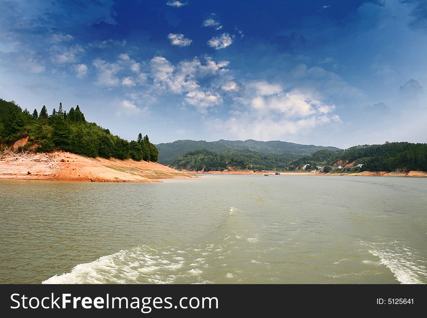 Blue sky green lake china. Blue sky green lake china