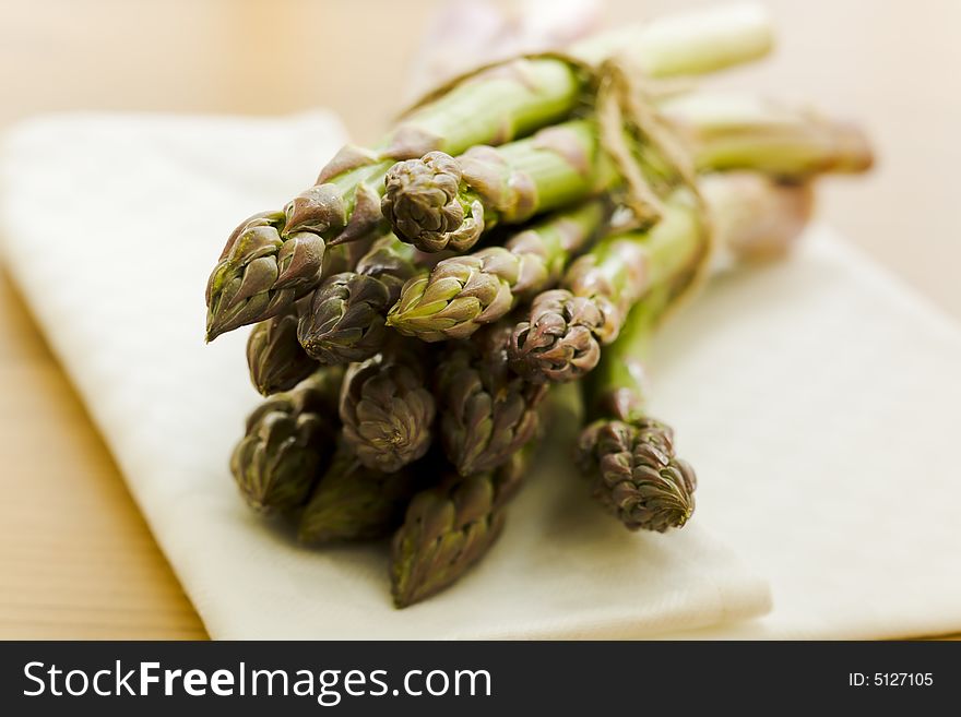 Pile of asparagus on the kitchen table