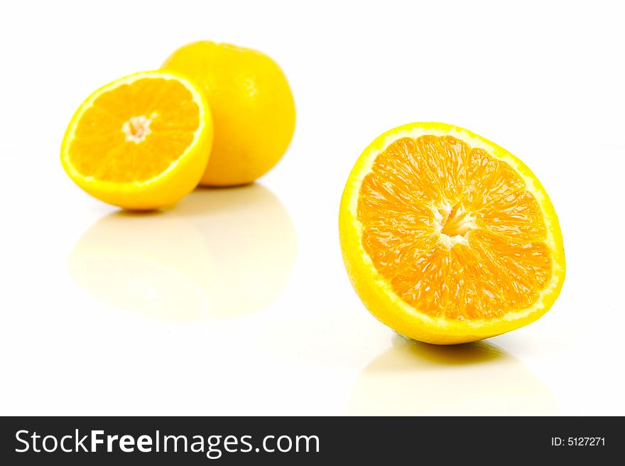 Orange citrus fruit isolated against a white background. Orange citrus fruit isolated against a white background