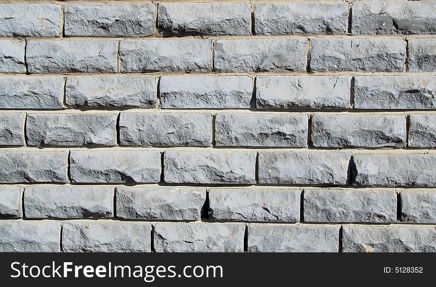 The old white brick wall for a background or structures
