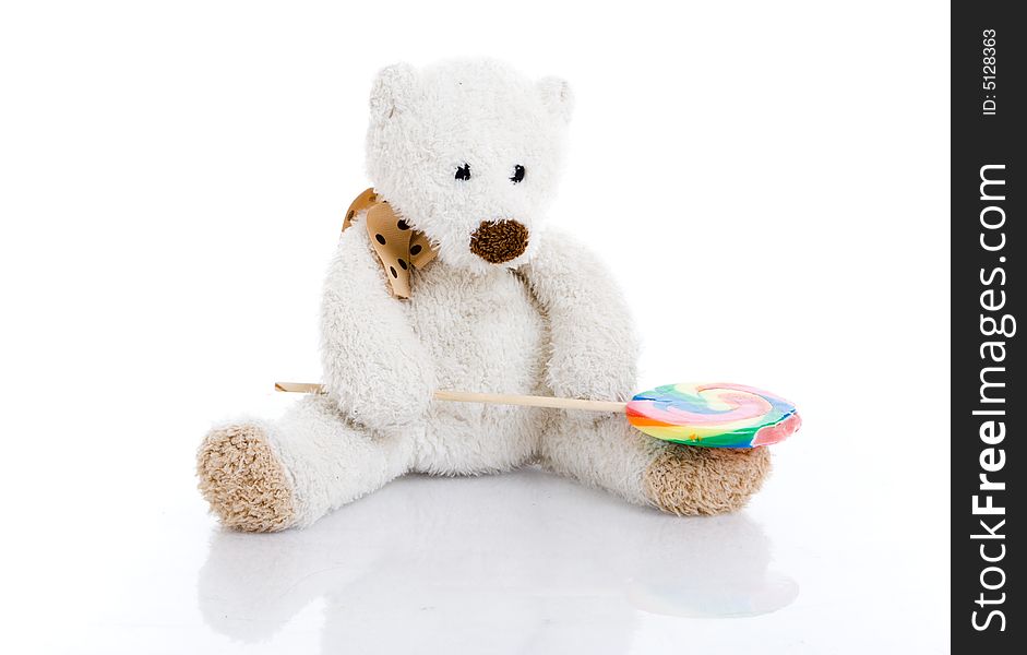 The teddy bear isolated on a white background
