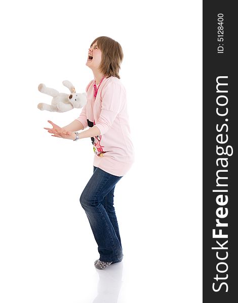 The young girl with a teddy bear isolated on a white background