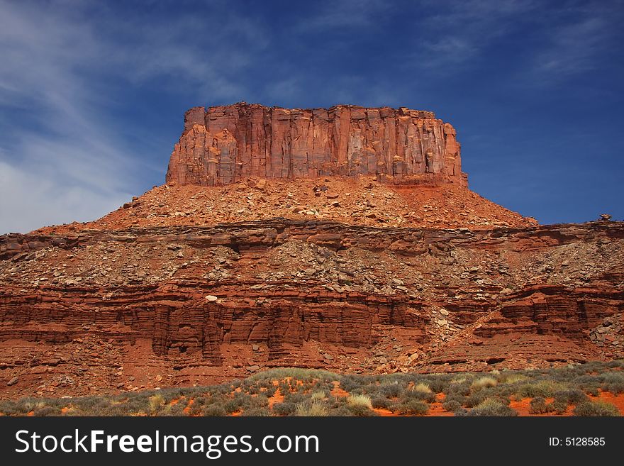 View of the red rock formations in Canyonlands National Park with blue sky�. View of the red rock formations in Canyonlands National Park with blue sky�