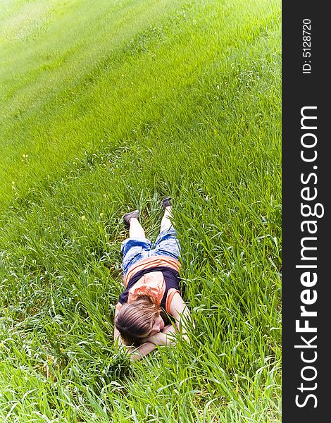 Blonde woman portrait over the grass. Blonde woman portrait over the grass