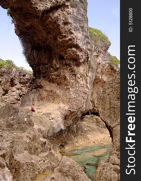 Talava arch - the sea has eroded the coral rock to form this archway.