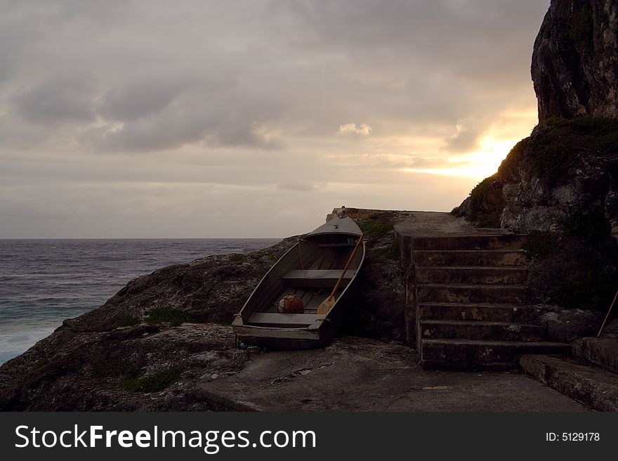 Fishing boat pulled up on the reef - Niue island. Fishing boat pulled up on the reef - Niue island.