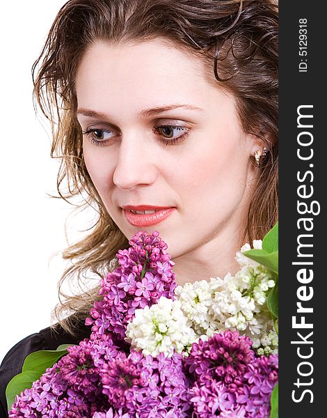 A girl with lilac. Isolated in white