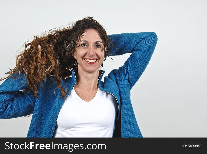 Attractive middle-aged caucasian woman with long brown hair. Attractive middle-aged caucasian woman with long brown hair.