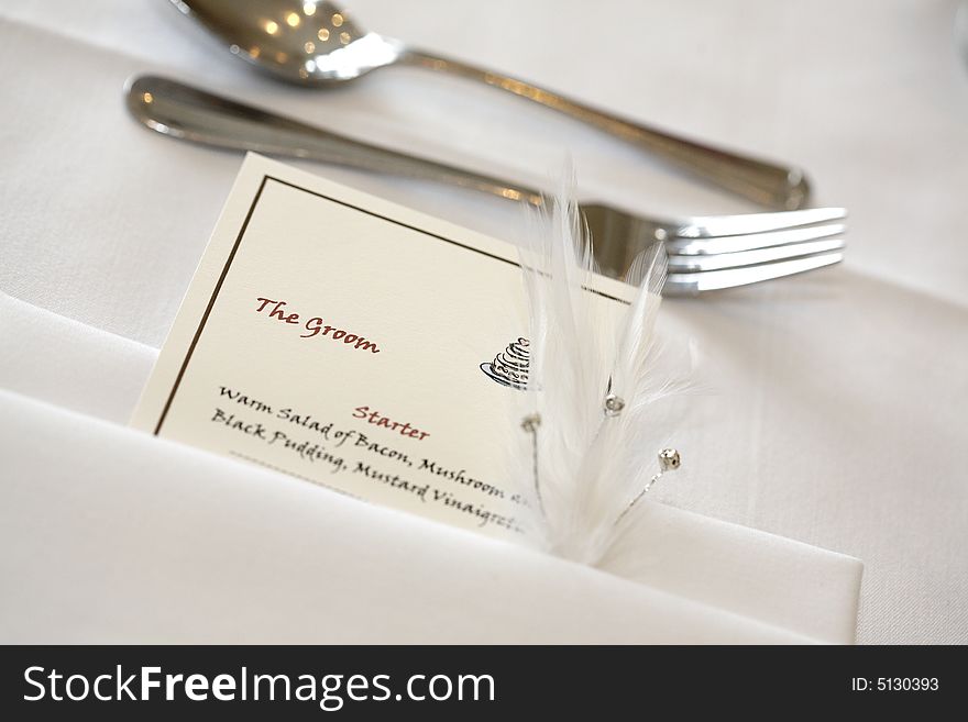 The bridegroom's place setting and menu