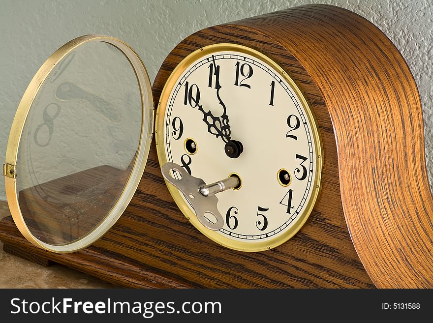 Image of a clock on a mantle. Image of a clock on a mantle.