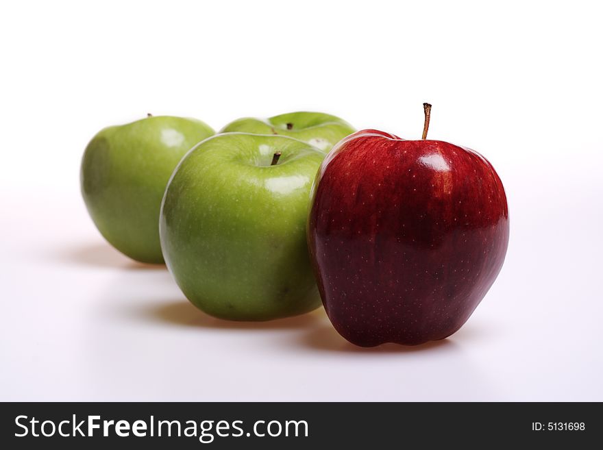 Red and green apples isolated on white background