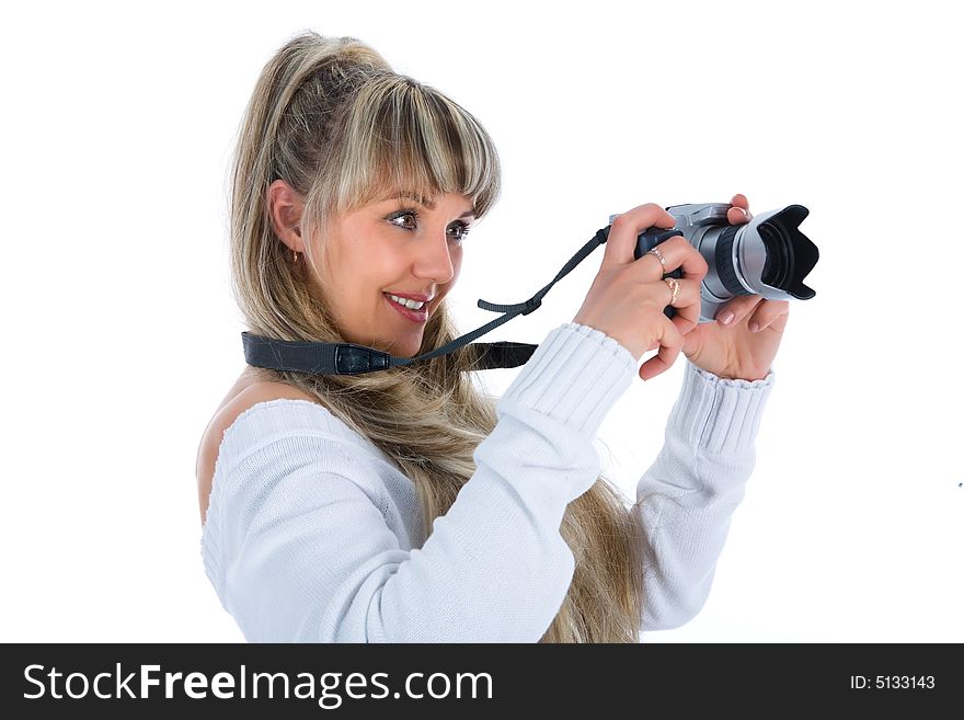 Woman with camera on white background