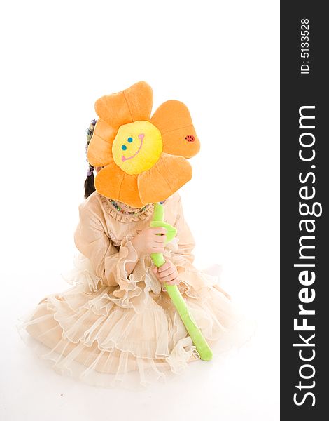 The young girl with flower isolated on a white