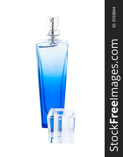 Perfume in deep blue scent-bottle on isolated background. Perfume in deep blue scent-bottle on isolated background.