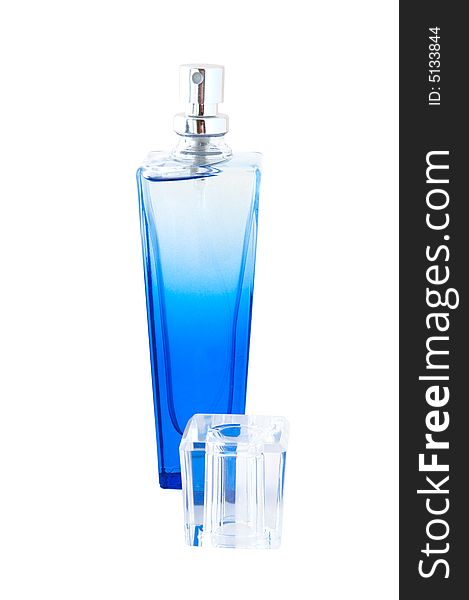 Perfume in deep blue scent-bottle.