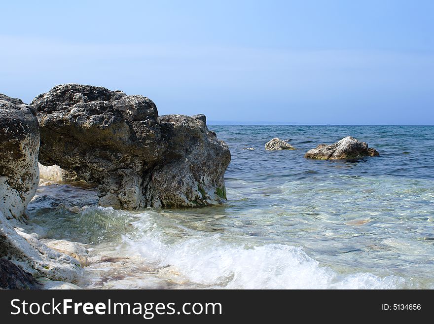 Sea tide and a rock, shot in Crimea