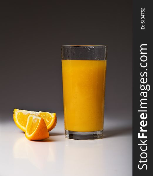 Orange segments and orange juice. Orange segments and orange juice