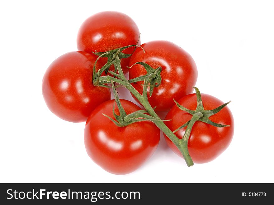 Red tomatoes isolated on white background