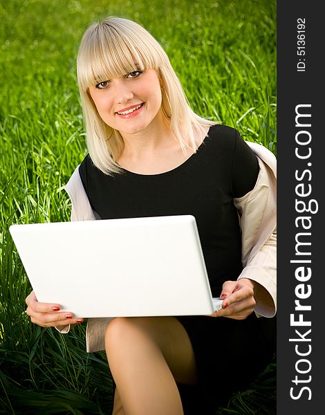 Portrait of smiling girl with laptop. Portrait of smiling girl with laptop