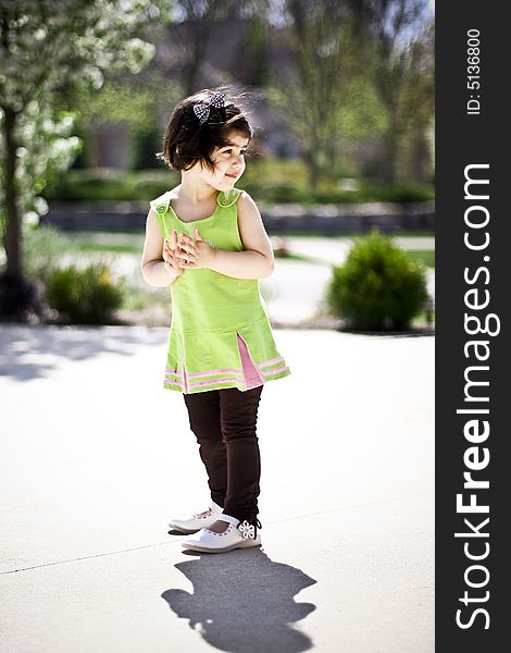 Toddler enjoying spring time in the front yard