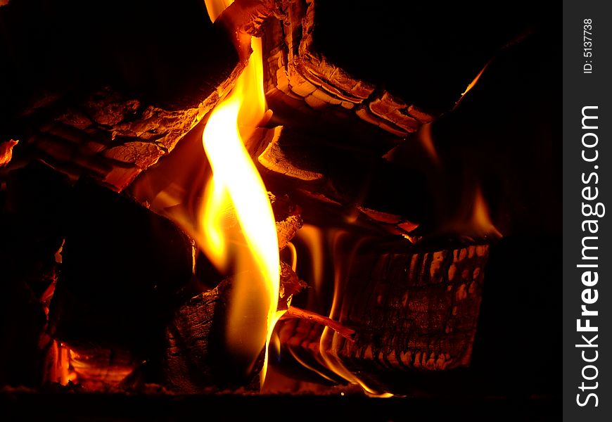 Fire in village stove. Russia