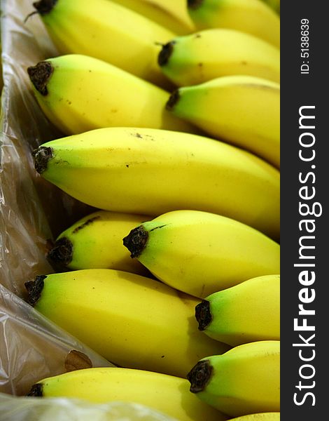 Fresh yellow bananas in a food crate. Fresh yellow bananas in a food crate