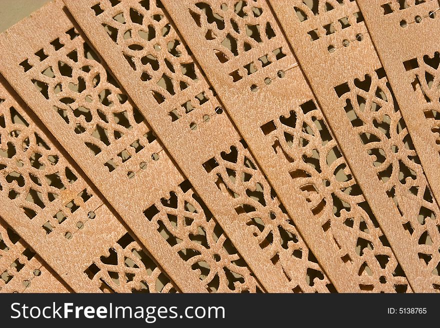 Close up view on chinese wooden fan. Close up view on chinese wooden fan