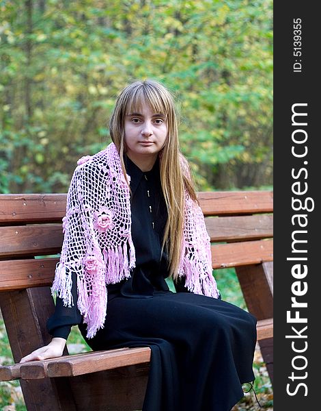 Portrait of the beautiful girl in autumn forest. Portrait of the beautiful girl in autumn forest.